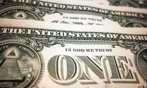 Eine US-Dollarnote, auf der "In God we trust" steht
